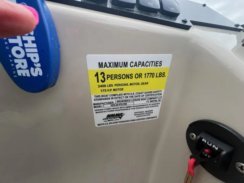 Slide: The Image of 2022 Harris Cruiser 230 capacity label, maximum 13 persons or 1770 lbs, 175 HP motor. - 18