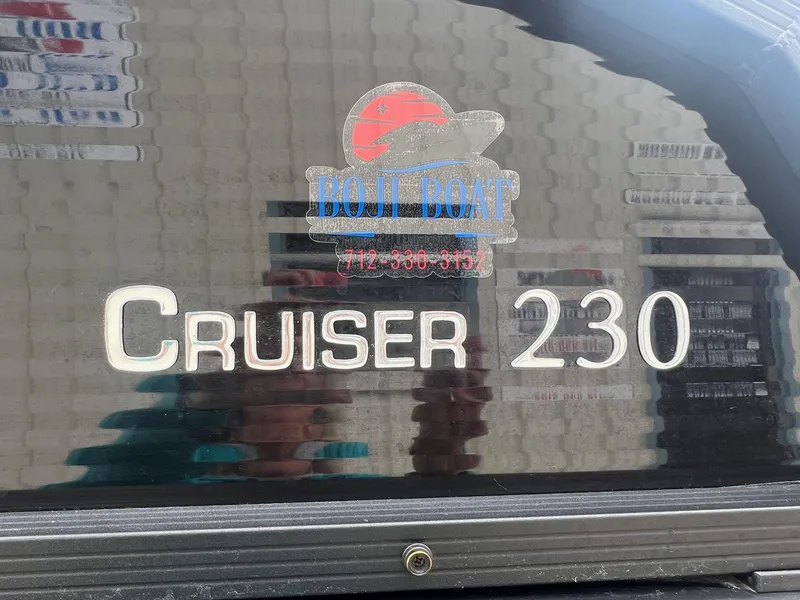 Slide: The Image of 2022 Harris Cruiser 230 boat logo with contact number. - 5