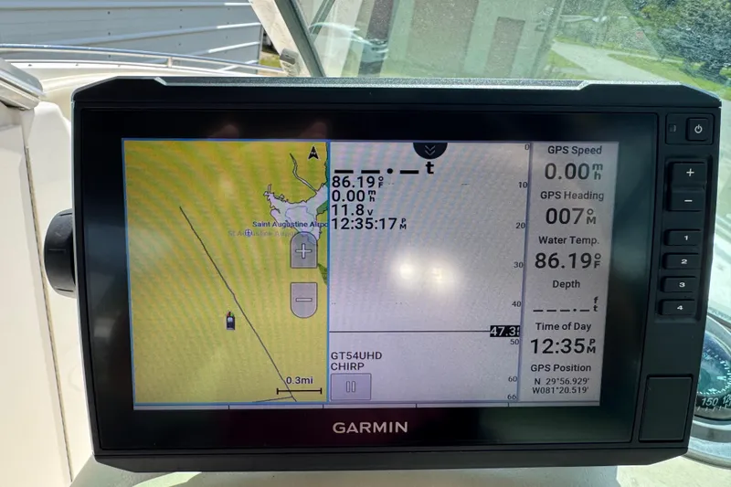 Slide: The Image of Garmin GPS display on a 2004 Chaparral 260 SSi boat, showing navigation data. - 12
