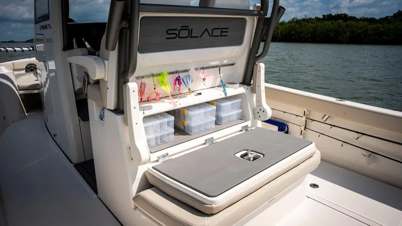 Slide: The Image of 2025 Solace 28 HCS boat with organized fishing tackle storage on deck. - 11