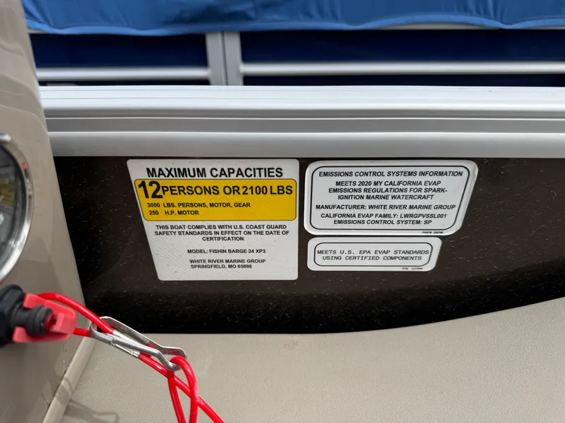 Slide: The Image of Capacity label on 2020 Sun Tracker Fishin' Barge 24 XP3, max 12 persons or 2100 lbs. - 15