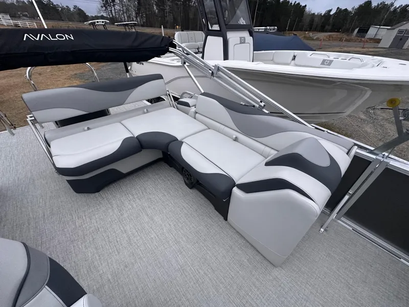 Slide: The Image of 2025 Avalon LSZ Cruise Rear Bench with sleek gray and white seating on a pontoon boat. - 3