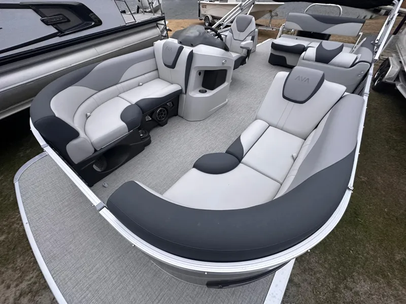 Slide: The Image of 2025 Avalon LSZ Cruise Rear Bench pontoon boat with luxurious seating and modern design. - 6