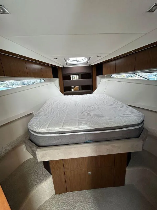Slide: The Image of 2014 Cruisers Yachts 41 Cantius cabin with bed, modern interior design. - 17