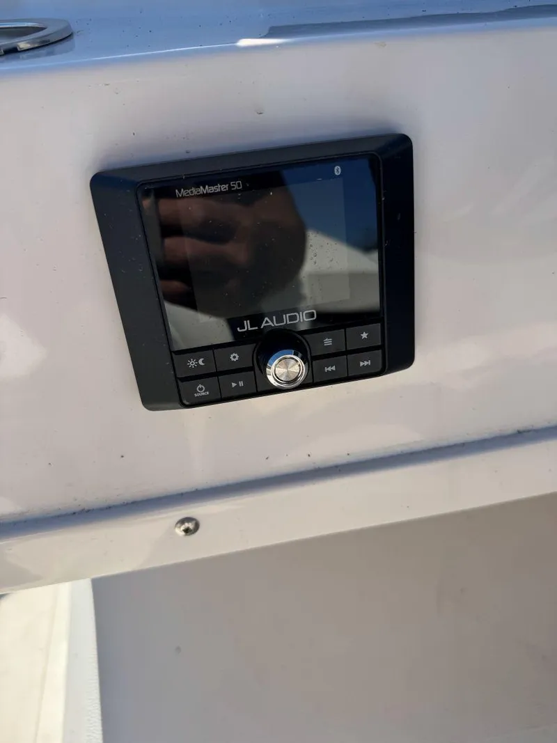 Slide: The Image of JL Audio MediaMaster 50 on 2022 Starcraft SVX 171 OB boat dashboard. - 4
