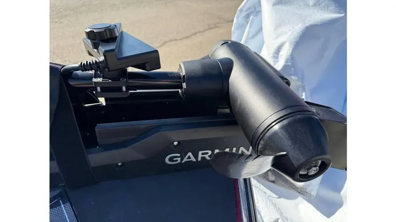 Slide: The Image of Triton 20XP Patriot 2025 boat with Garmin trolling motor attachment. - 9