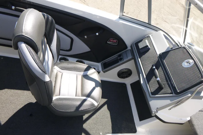 Slide: The Image of 2024 Ranger 1850MS boat interior with sleek seating and modern dashboard design. - 20