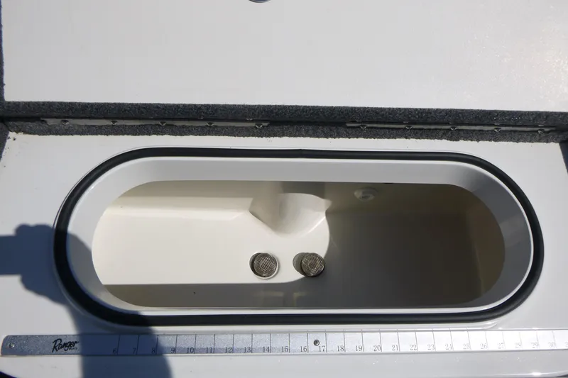 Slide: The Image of 2024 Ranger 1850MS boat livewell with ruler for measuring fish. - 30