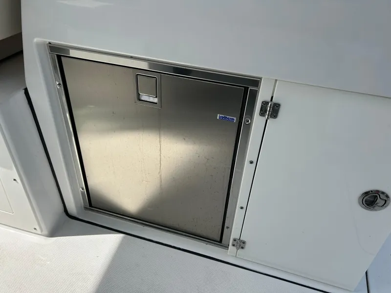 Slide: The Image of 2023 Blackfin 272 DC boat with stainless steel storage compartment. - 14