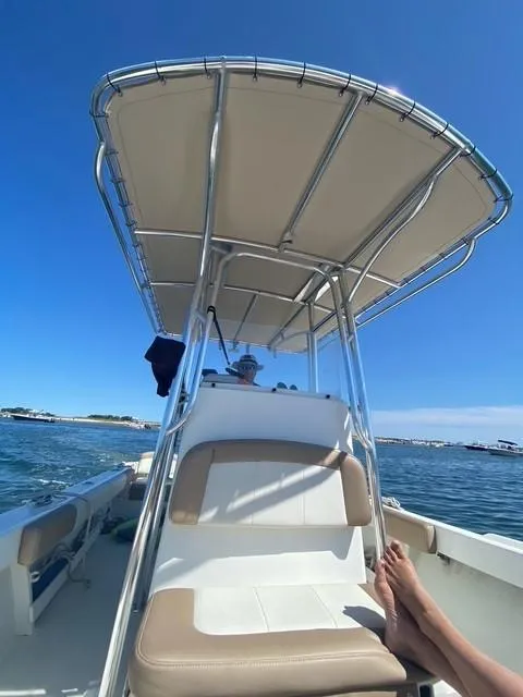 Slide: The Image of 2018 Parker 21SE Center Console boat on water, sunny day, clear blue sky. - 3