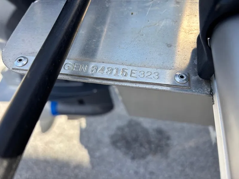 Slide: The Image of 2023 SunCatcher Select 18F boat identification plate with serial number. - 19