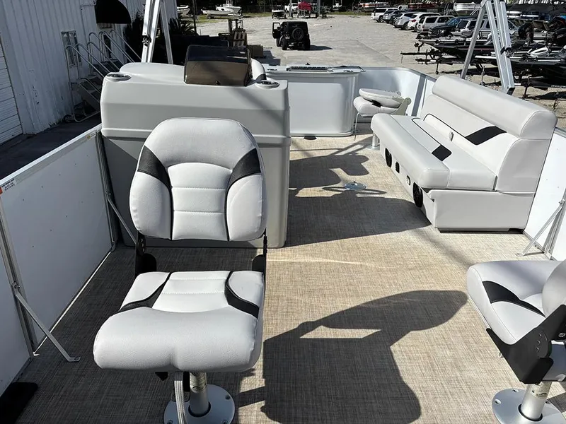 Slide: The Image of 2023 SunCatcher Select 18F pontoon boat interior with seating and helm station. - 8