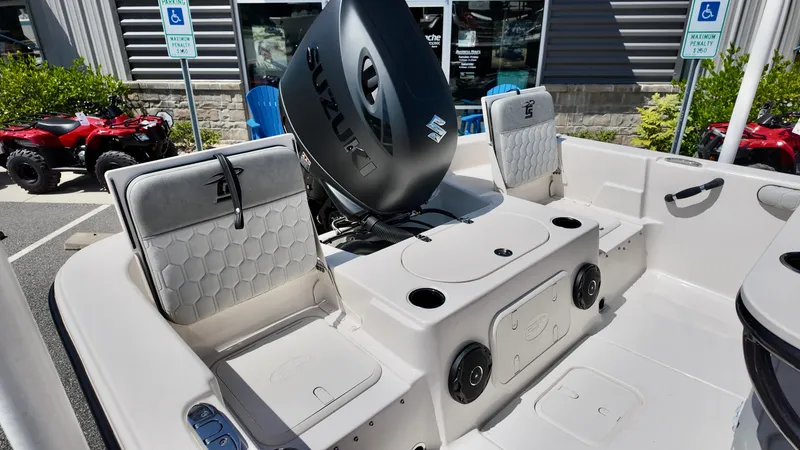 Slide: The Image of 2025 Carolina Skiff 21 LS Stealth Edition boat interior with Suzuki engine. - 10