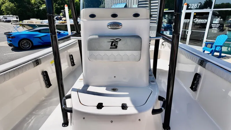 Slide: The Image of 2025 Carolina Skiff 21 LS Stealth Edition boat interior with console and seating. - 12