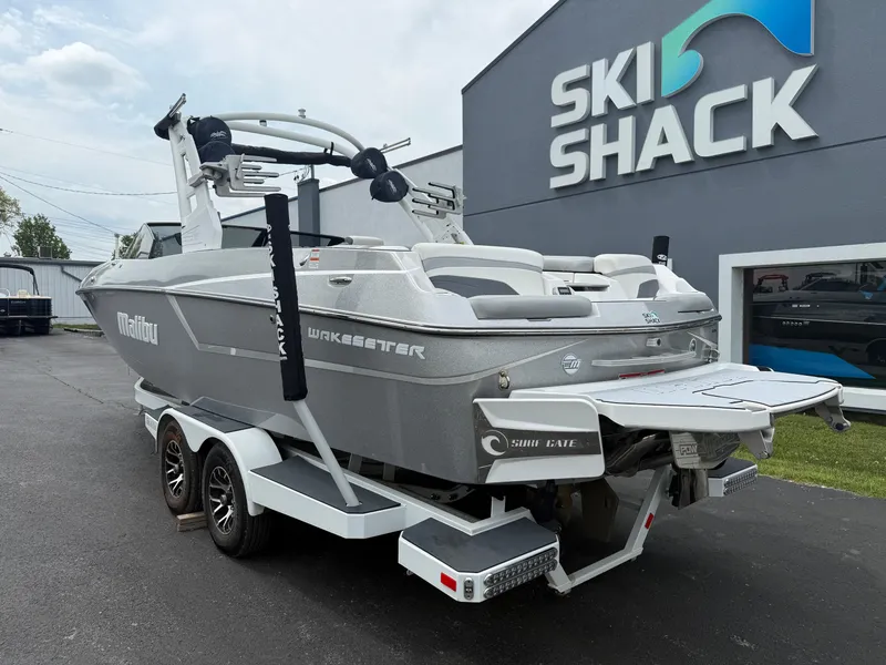Slide: The Image of 2020 Malibu Wakesetter 24 MXZ boat on trailer at Ski Shack dealership. - 9