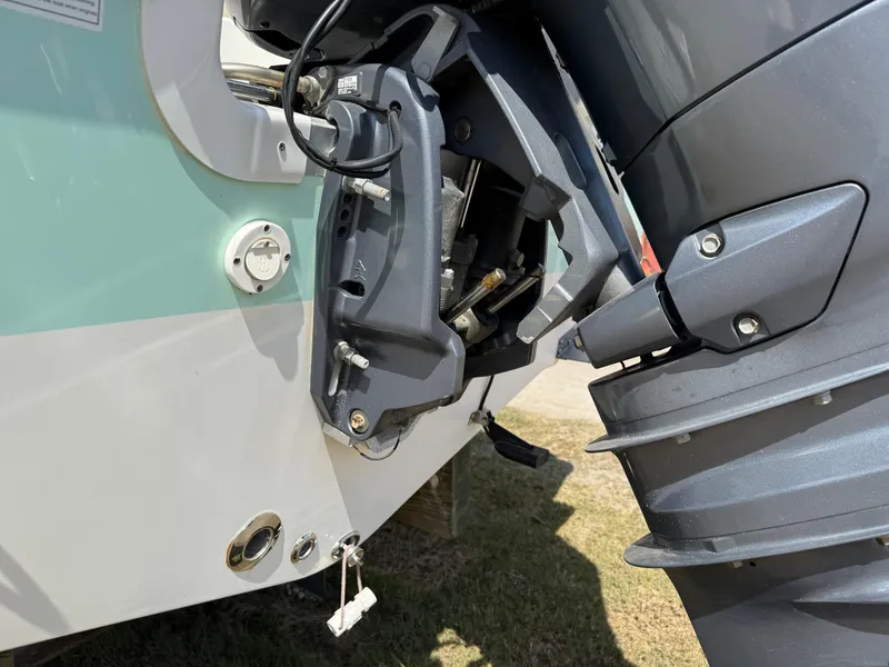 Slide: The Image of Outboard motor of 2016 NauticStar 2102 Legacy boat, close-up view. - 18