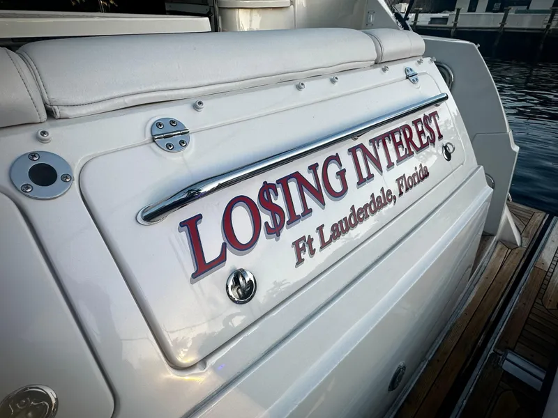 Slide: The Image of 2015 Sea Ray 510 Fly yacht named "Losing Interest" docked in Ft. Lauderdale, Florida. - 11