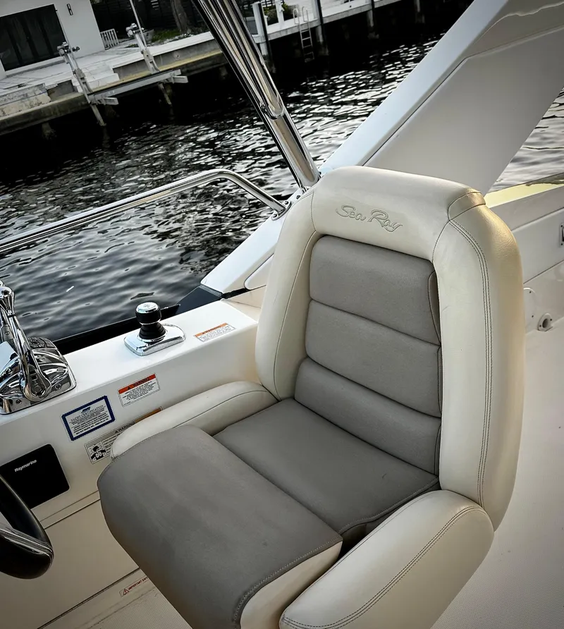 Slide: The Image of Captain's chair on 2015 Sea Ray 510 Fly yacht, dockside view. - 19