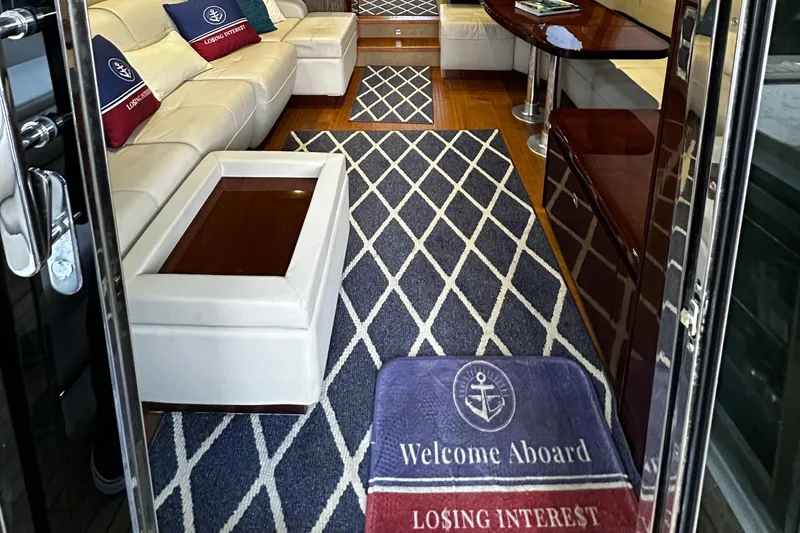 Slide: The Image of Luxurious interior of 2015 Sea Ray 510 Fly yacht with elegant seating and nautical decor. - 25