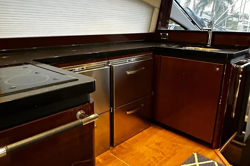 Slide: The Image of Luxurious kitchen interior of 2015 Sea Ray 510 Fly yacht with modern appliances. - 35