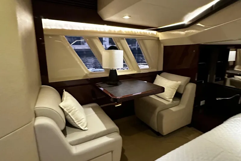 Slide: The Image of Luxurious interior of 2015 Sea Ray 510 Fly yacht with elegant seating and table. - 44