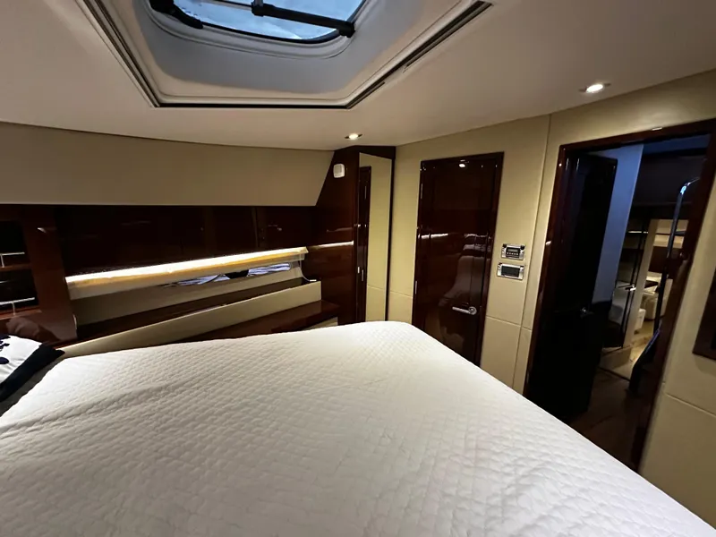 Slide: The Image of Luxurious interior of 2015 Sea Ray 510 Fly yacht with elegant wood finishes. - 47