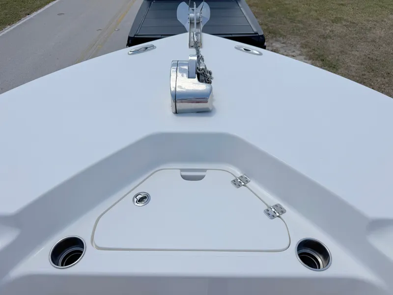 Slide: The Image of 2017 Key West 244 Center Console boat bow with anchor and storage compartment. - 12
