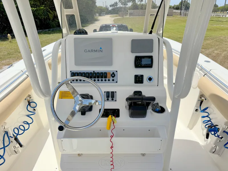 Slide: The Image of 2017 Key West 244 Center Console boat dashboard with Garmin navigation system. - 21