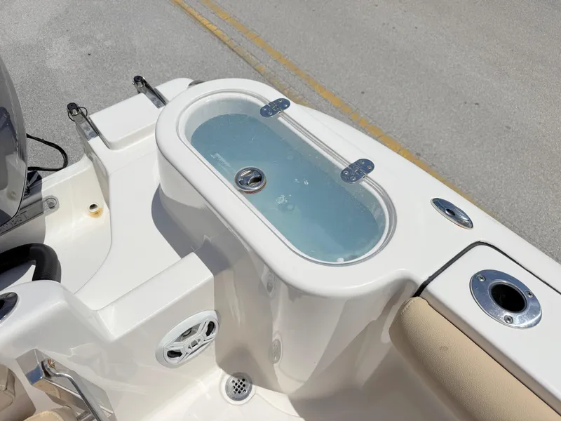 Slide: The Image of 2017 Key West 244 Center Console boat with livewell and rod holders. - 28