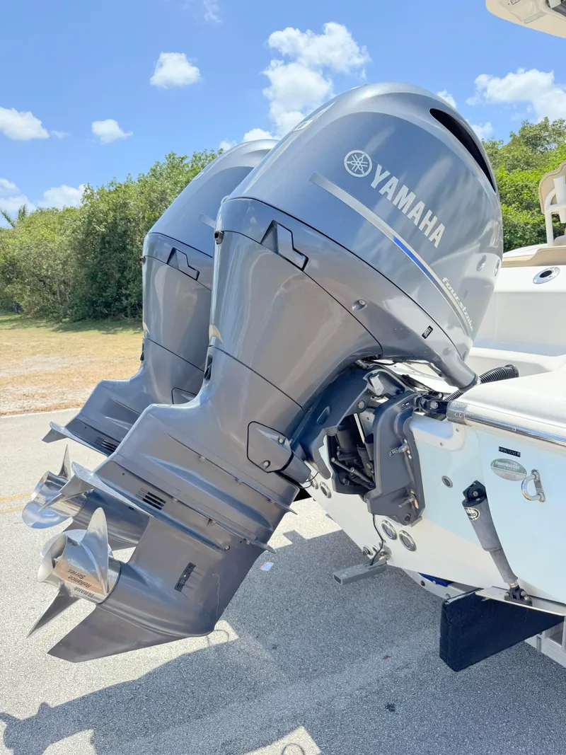 Slide: The Image of 2017 Key West 244 Center Console with dual Yamaha outboard motors. - 34