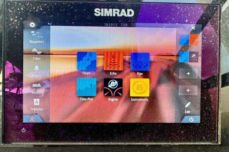 Slide: The Image of Simrad marine display on 2021 Sea Ray SDX 270, showing navigation and engine controls. - 18
