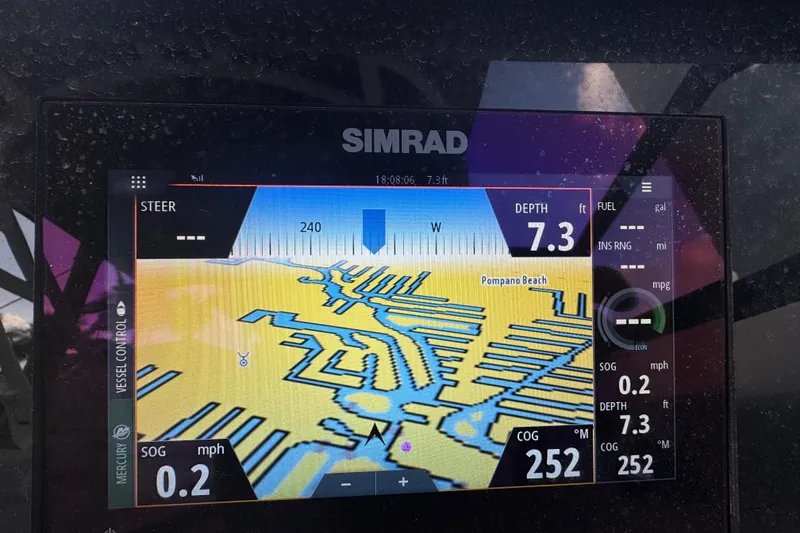 Slide: The Image of Simrad navigation display on 2021 Sea Ray SDX 270, showing Pompano Beach map and depth. - 24