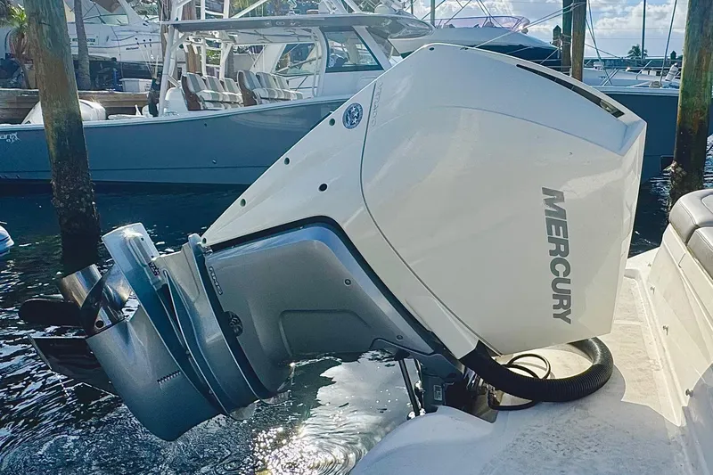 Slide: The Image of 2021 Sea Ray SDX 270 with Mercury outboard engine at marina. - 27