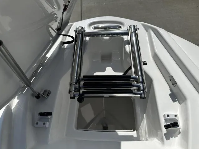 Slide: The Image of 2025 Yamaha AR250 boat with a folded stainless steel ladder on deck. - 18