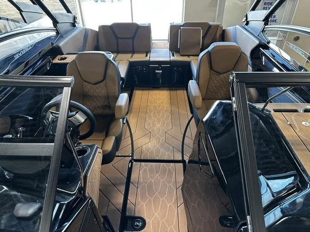 Slide: The Image of 2025 Yamaha Boats 255XD interior with luxurious seating and modern design. - 21