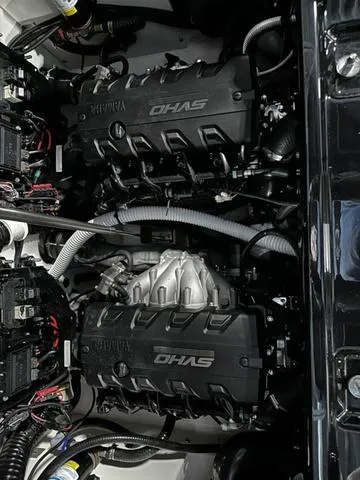 Slide: The Image of 2025 Yamaha Boats 255XD engine compartment showcasing dual OHAS engines. - 24