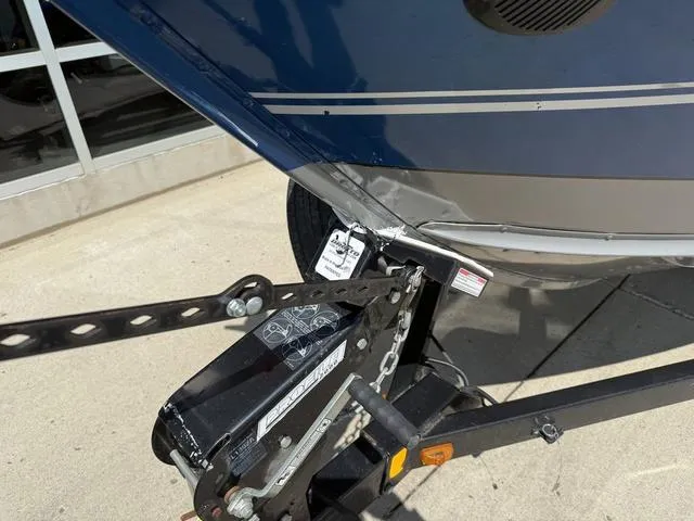 Slide: The Image of 2012 Lund 1750 Tyee boat on trailer, close-up of hitch and bow area. - 6