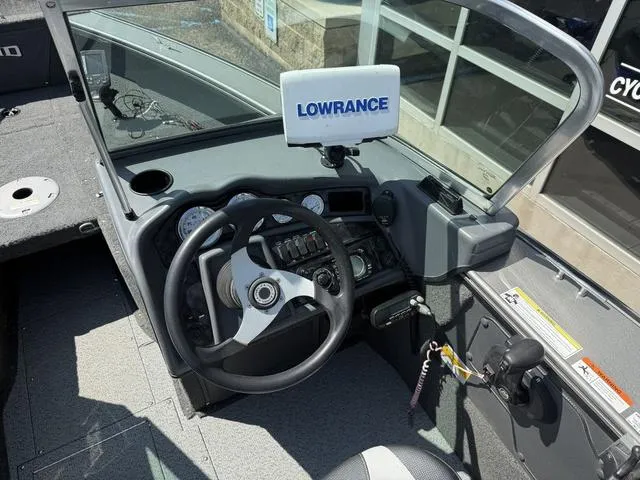 Slide: The Image of 2012 Lund 1750 Tyee boat dashboard with Lowrance navigation system. - 7