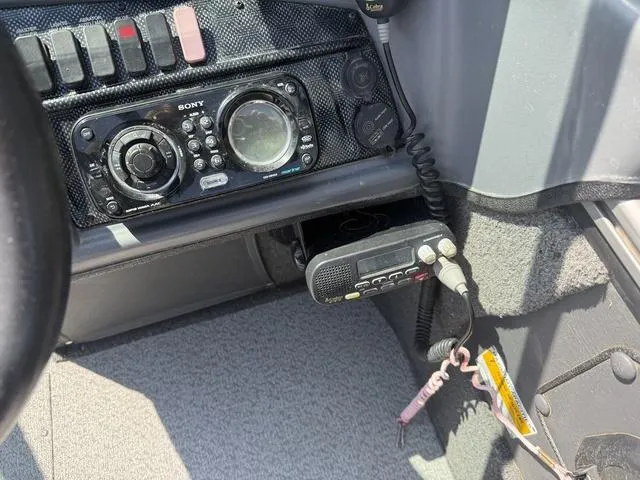 Slide: The Image of 2012 Lund 1750 Tyee boat dashboard with Sony stereo and communication equipment. - 8