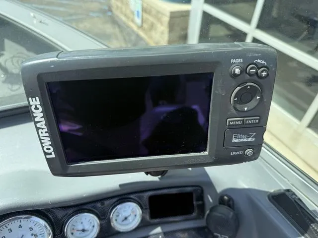 Slide: The Image of Lowrance Elite-7 fishfinder on 2012 Lund 1750 Tyee boat dashboard. - 9