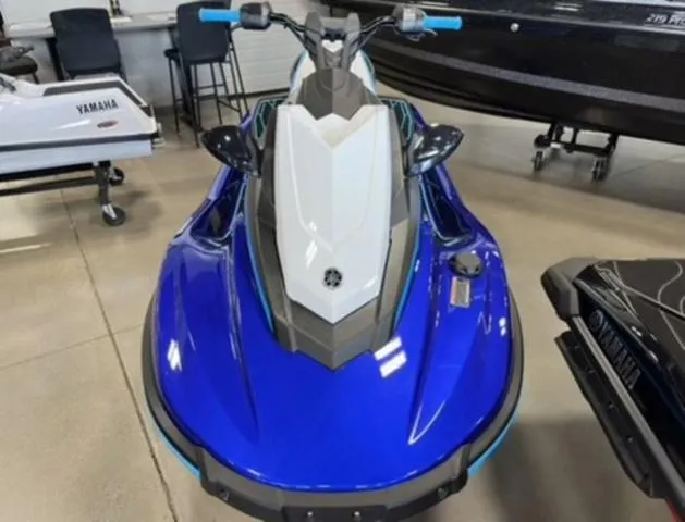 Slide: The Image of 2024 Yamaha Waverunner Jetblaster in showroom, featuring sleek blue and white design. - 4