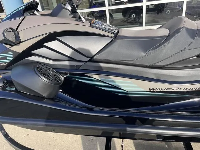 Slide: The Image of 2025 Yamaha Waverunner GP SVHO™ with Audio, sleek design, parked outdoors. - 12