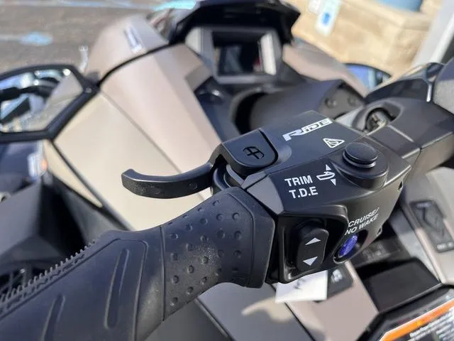 Slide: The Image of 2025 Yamaha Waverunner GP SVHO™ handlebar controls with audio system, close-up view. - 16