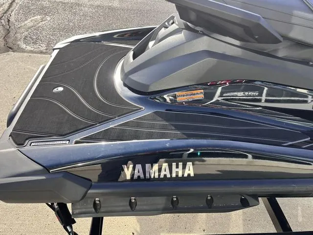 Slide: The Image of 2025 Yamaha Waverunner GP SVHO™ with Audio, sleek design, black finish, close-up view. - 25