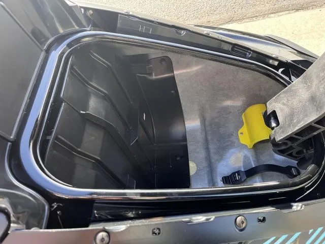 Slide: The Image of 2025 Yamaha Waverunner GP SVHO™ storage compartment with audio system, open view. - 8