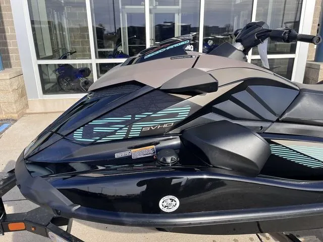 Slide: The Image of 2025 Yamaha Waverunner GP SVHO™ with Audio, sleek design, parked outside showroom. - 9