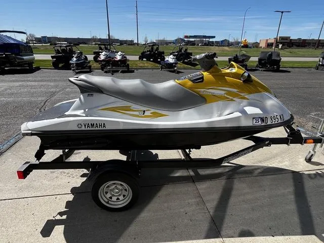 Slide: The Image of 2015 Yamaha WaveRunner V1 jet ski on trailer, parked outdoors. - 10