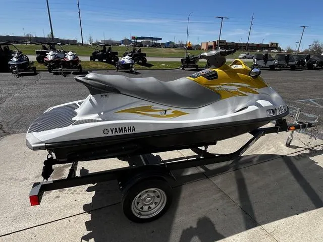 Slide: The Image of 2015 Yamaha WaveRunner V1 jet ski on trailer, parked outdoors. - 11