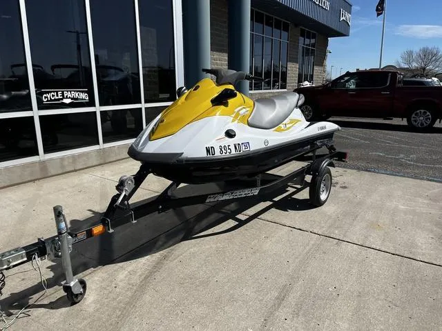 Slide: The Image of 2015 Yamaha WaveRunner V1 jet ski on trailer, parked outside dealership. - 4