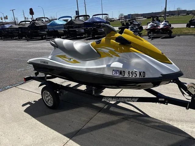 Slide: The Image of 2015 Yamaha WaveRunner V1 jet ski on trailer, parked outdoors. - 8